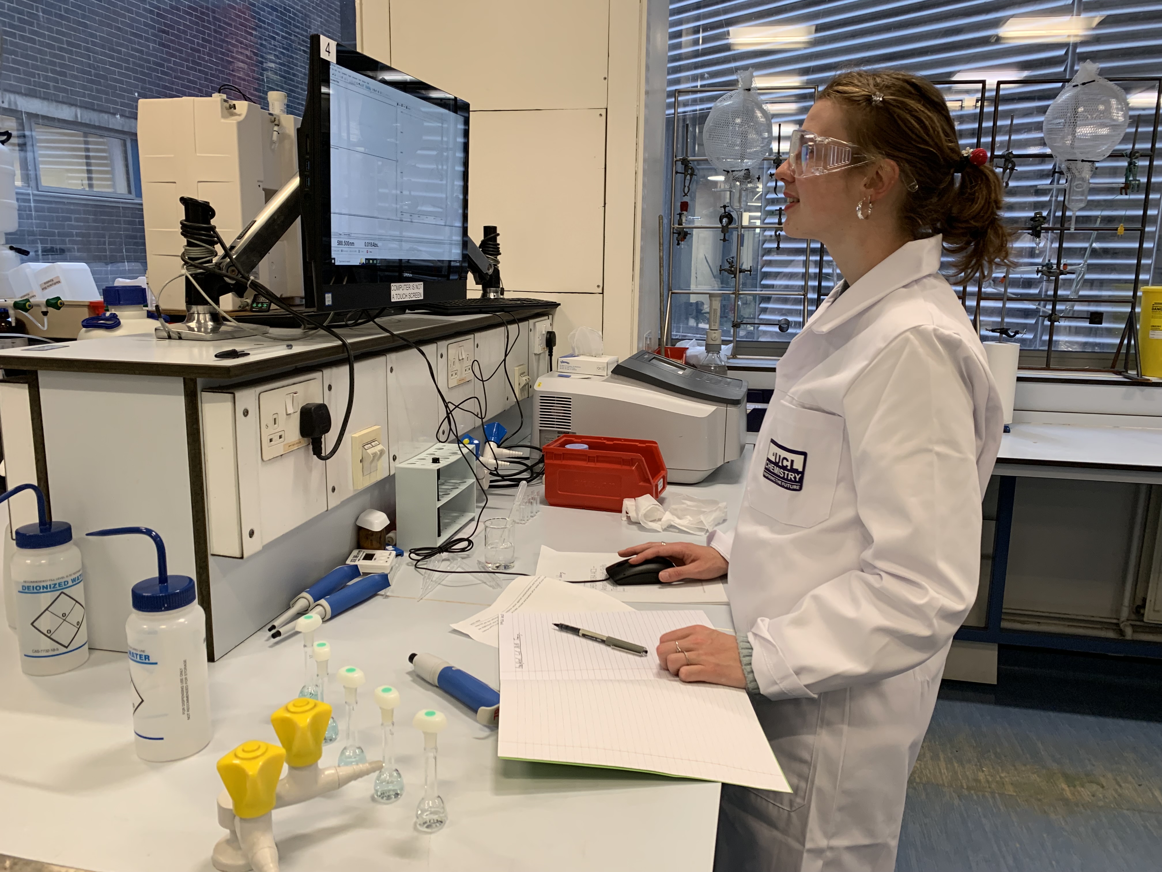 Scientist working on a computer