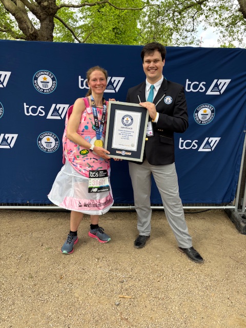 Professor Melaine Bailey accepting her Guinness world record cetificate